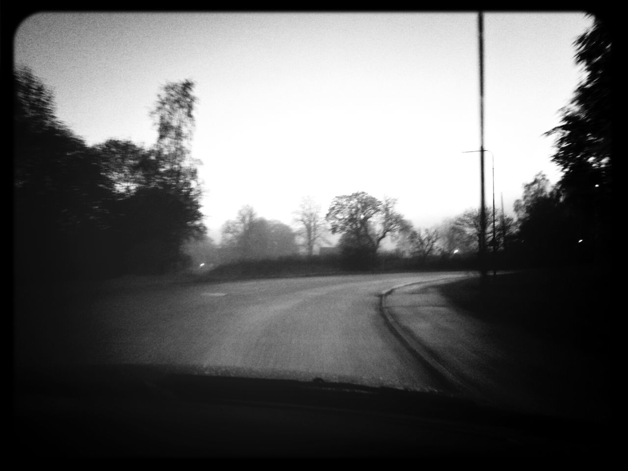 ROAD PASSING THROUGH COUNTRY ROAD