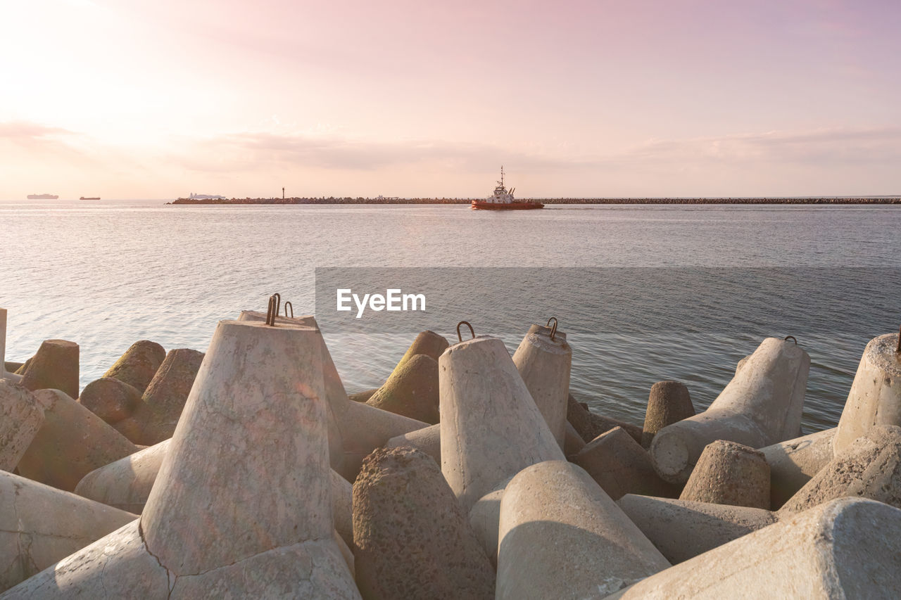 SCENIC VIEW OF SEA DURING SUNSET