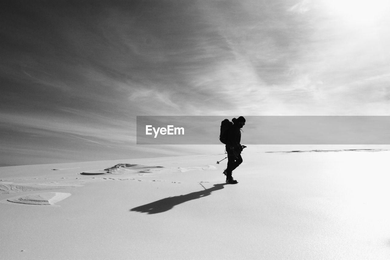 Full length of man on snow against sky