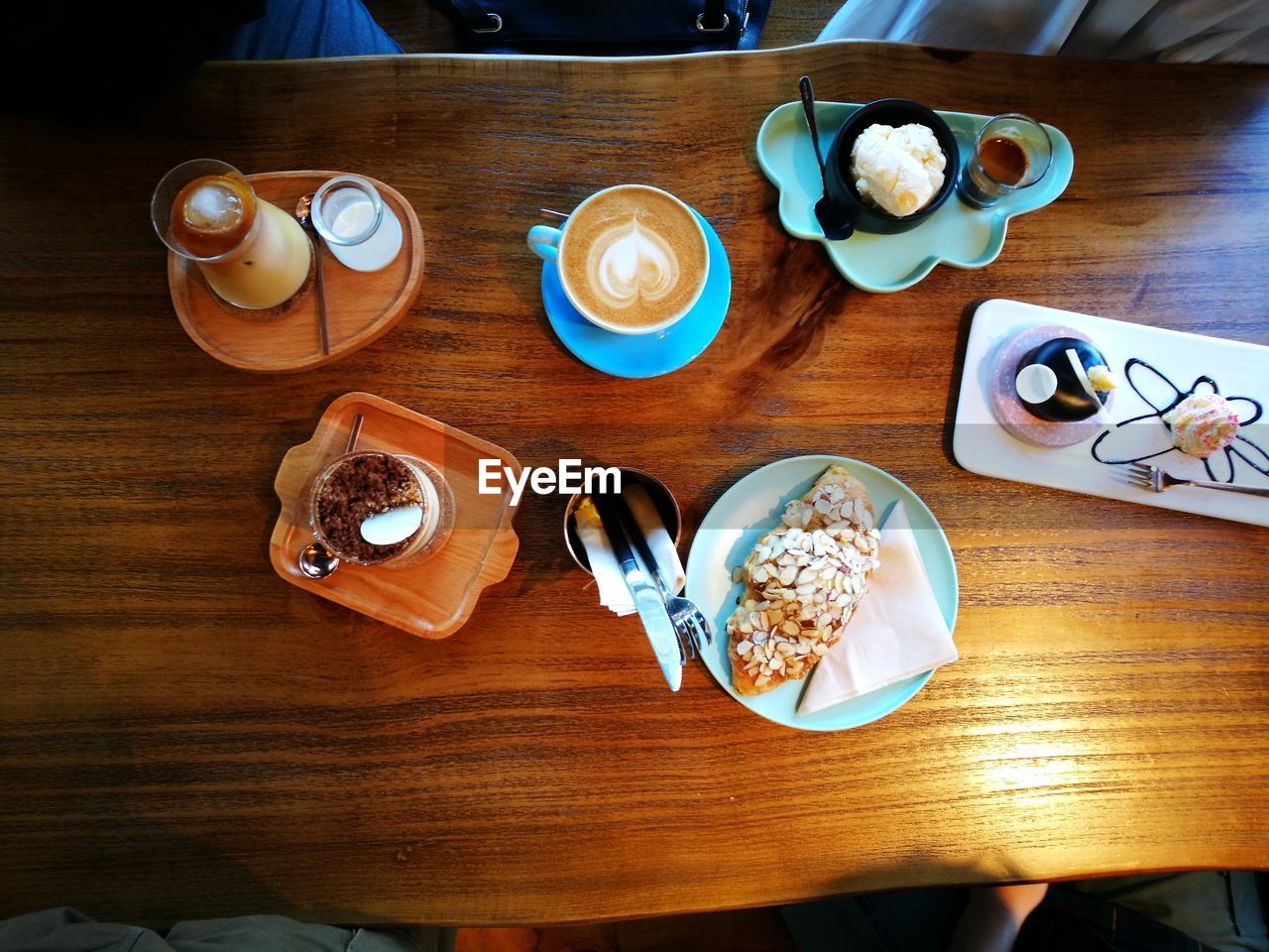 HIGH ANGLE VIEW OF BREAKFAST ON TABLE WITH COFFEE CUP