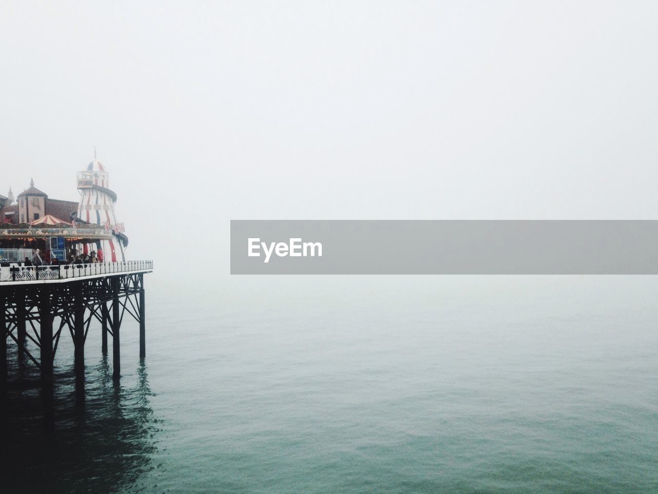 VIEW OF PIER IN CALM SEA