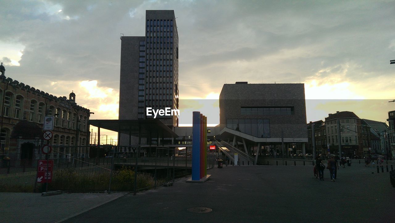 BUILDINGS IN CITY AT SUNSET