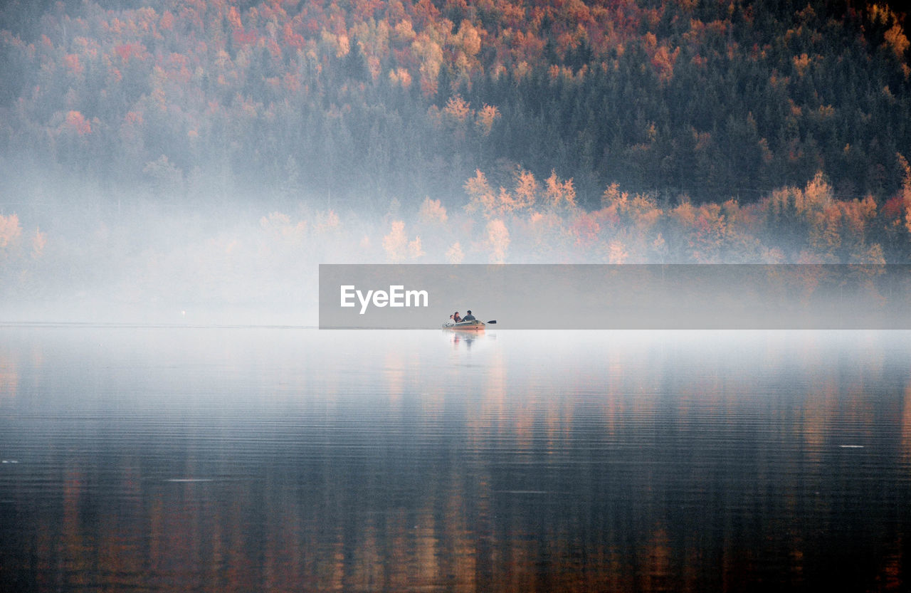 Lake at forest during autumn