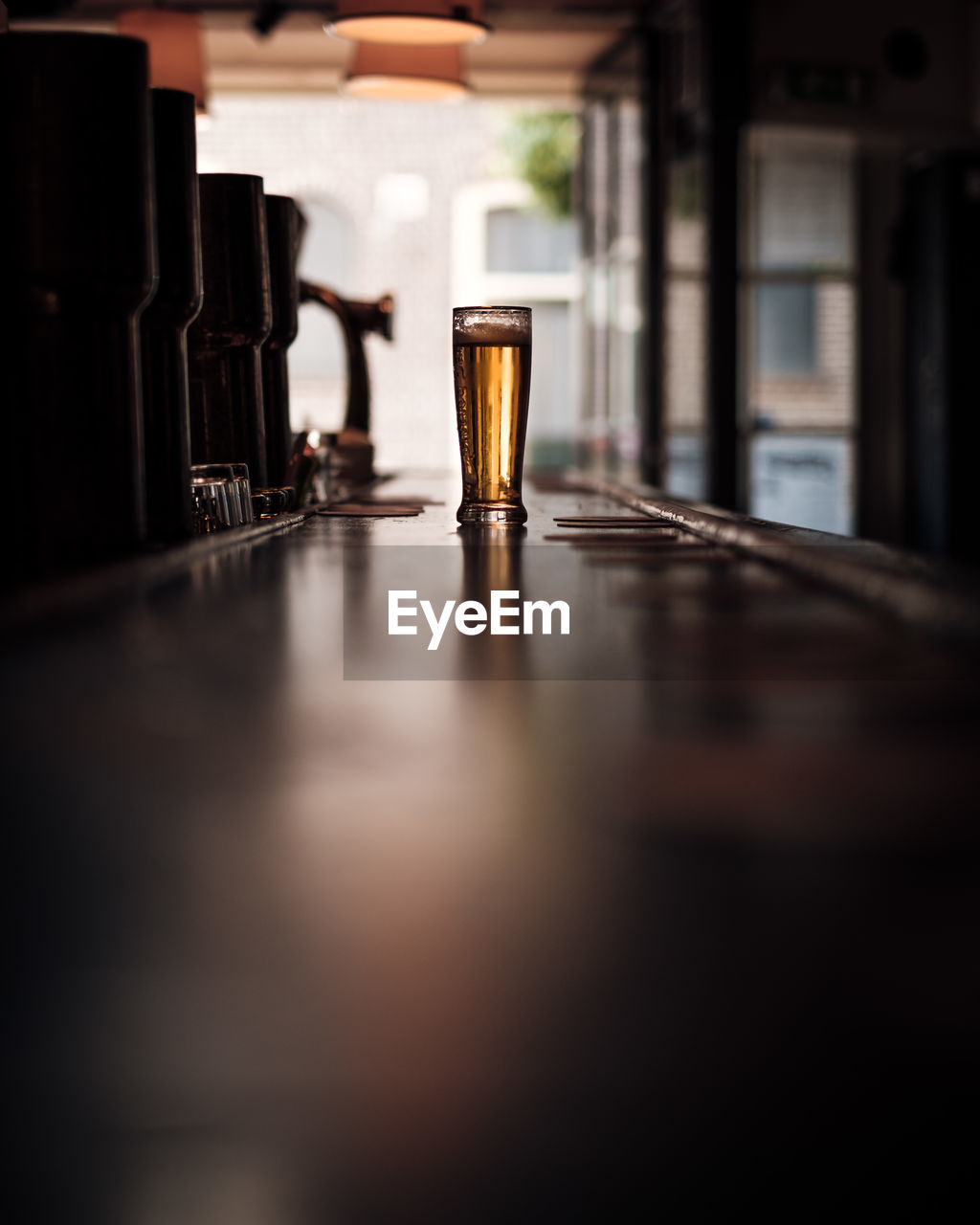 Close-up of beer on table