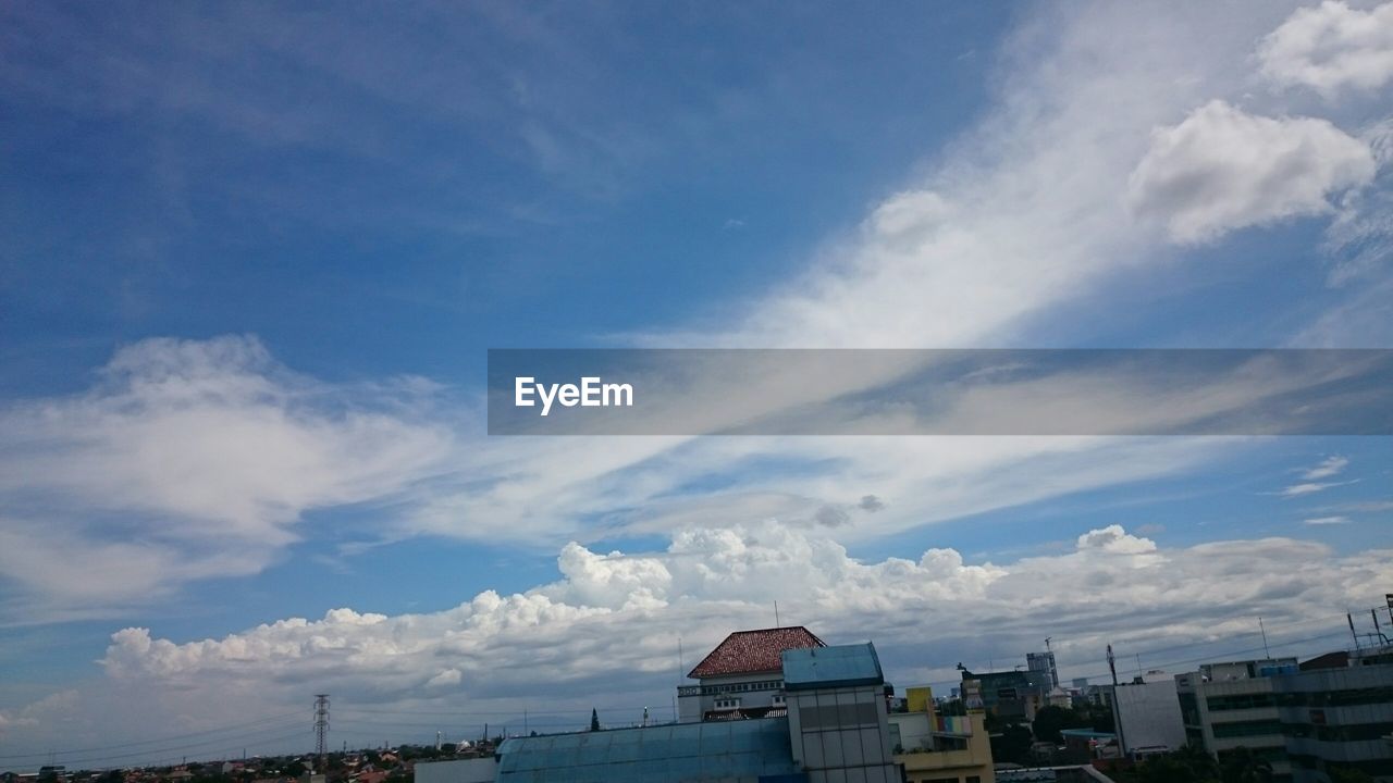 CLOUDY SKY OVER LANDSCAPE