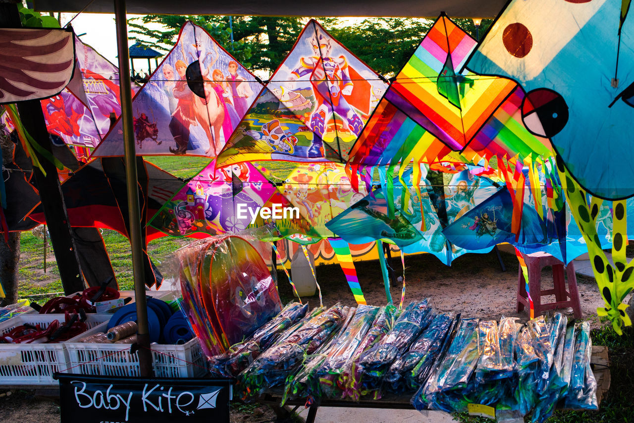 Colorful kites at market for sale