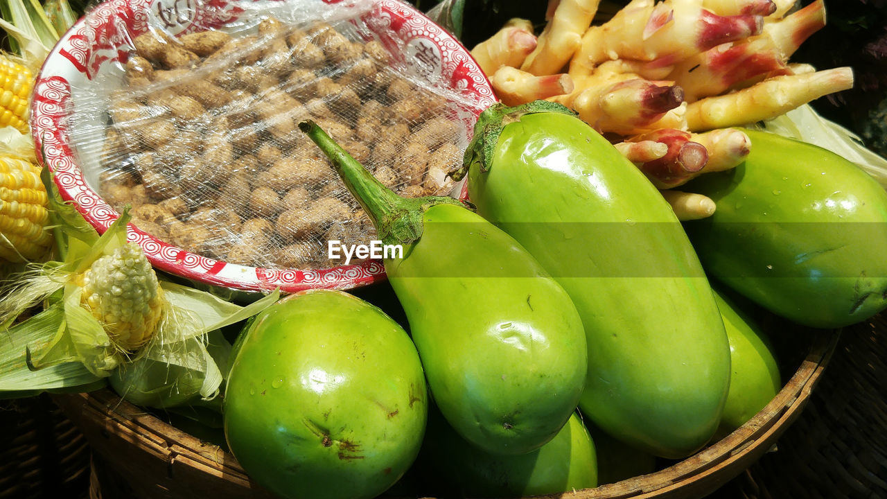 CLOSE-UP OF FRUITS IN BASKET FOR SALE