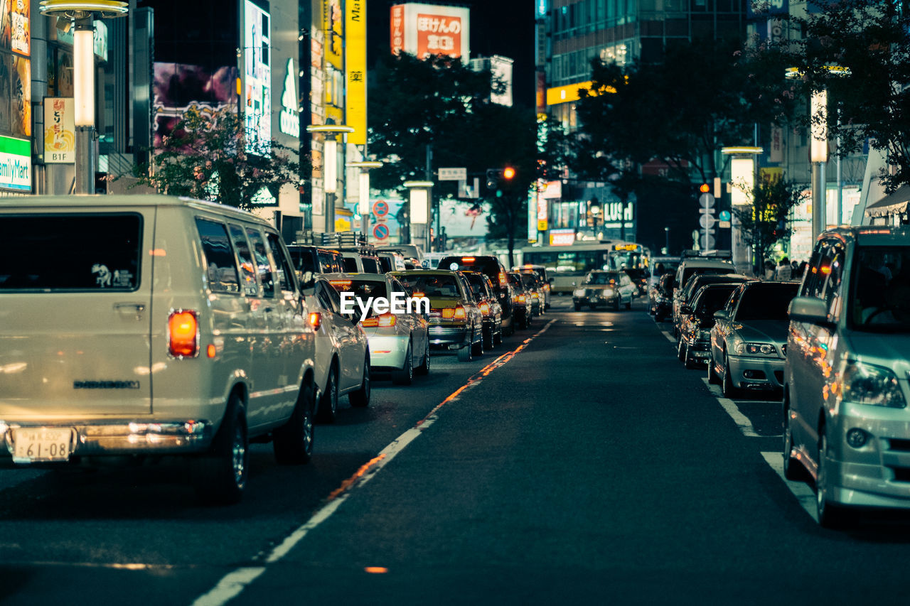 Traffic on city street at night