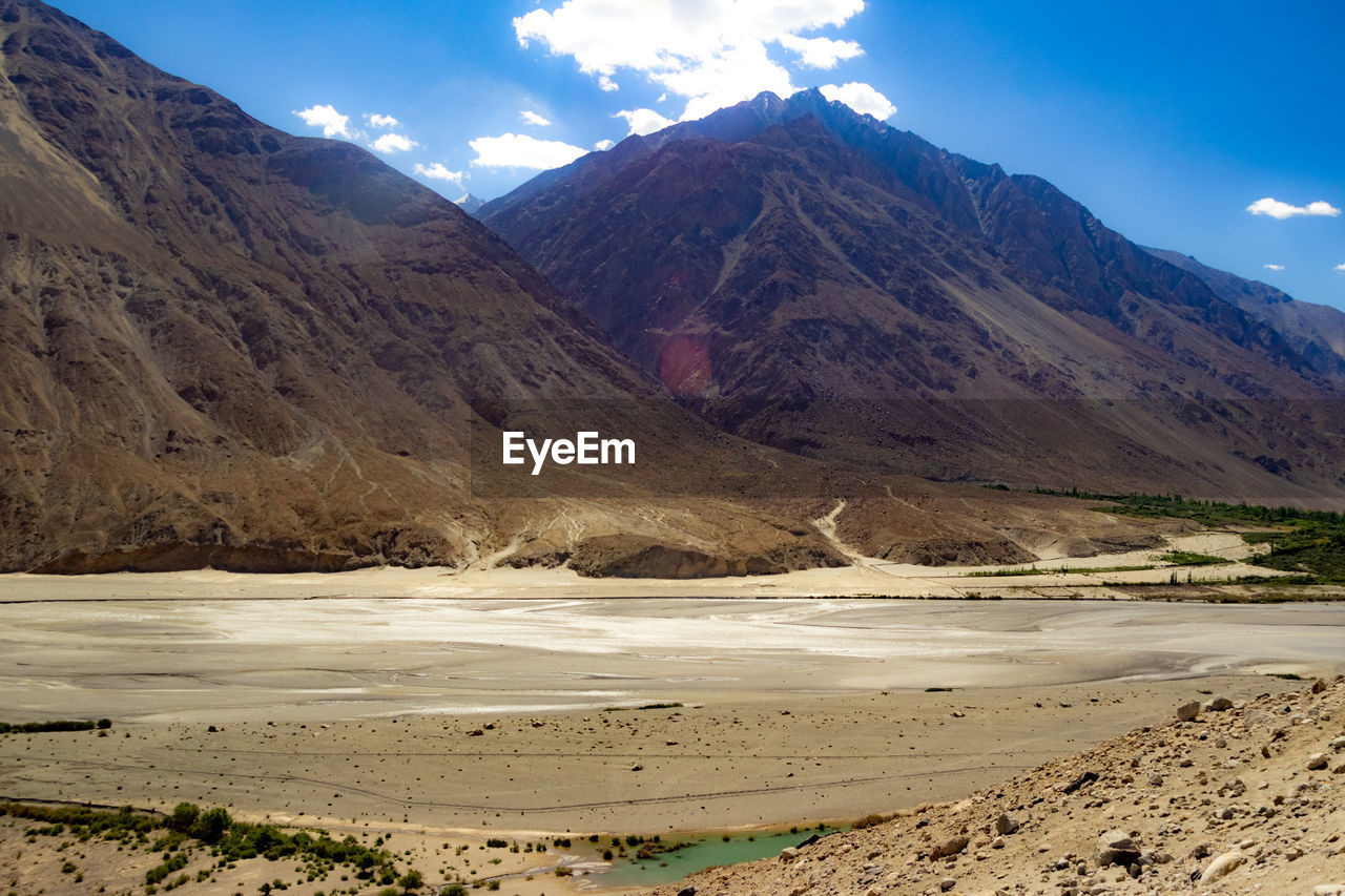 SCENIC VIEW OF MOUNTAIN AGAINST SKY