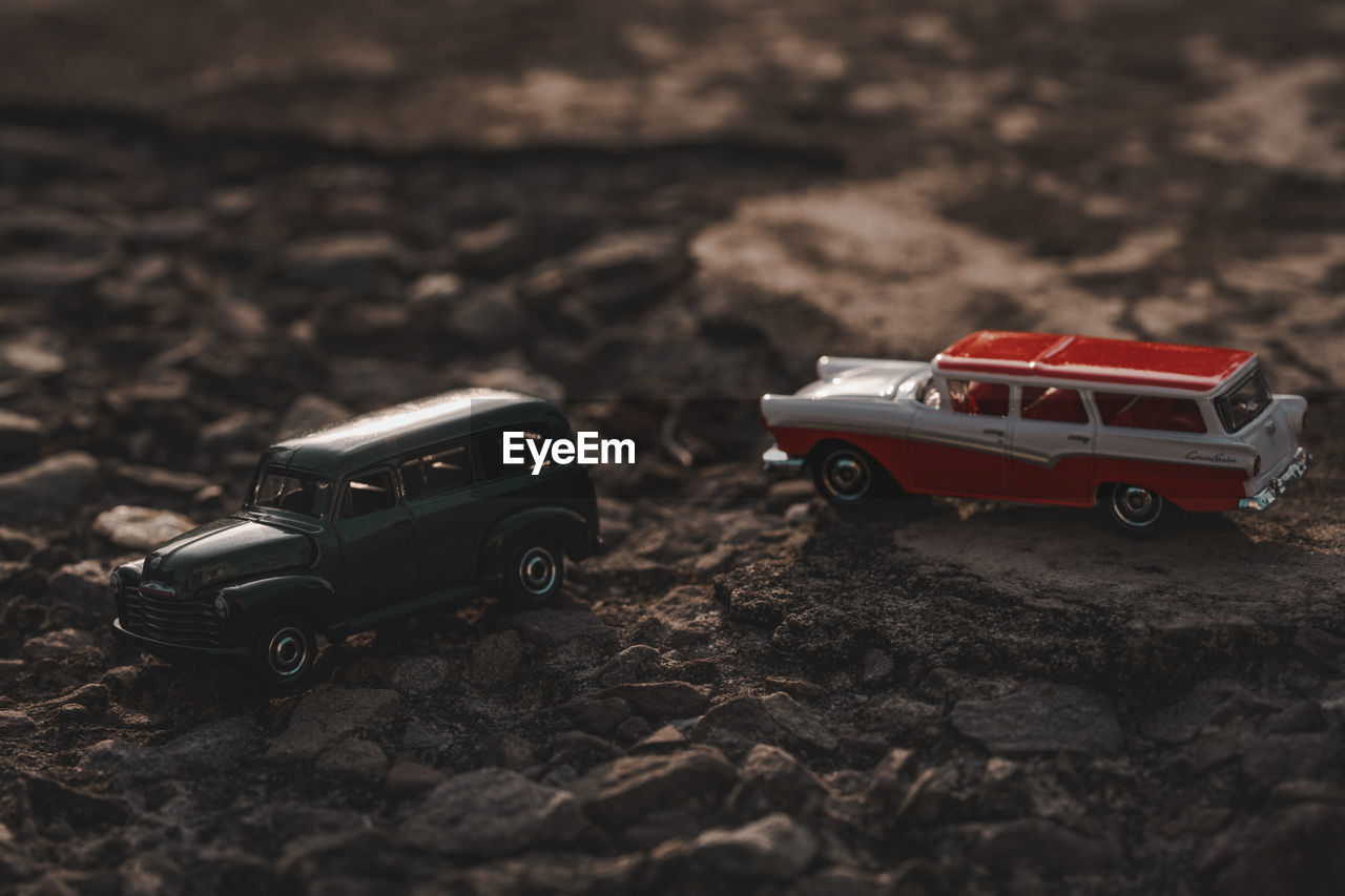 car, vehicle, mode of transportation, motor vehicle, transportation, land vehicle, toy, toy car, off-roading, wheel, land, childhood, nature, selective focus, truck, dirt