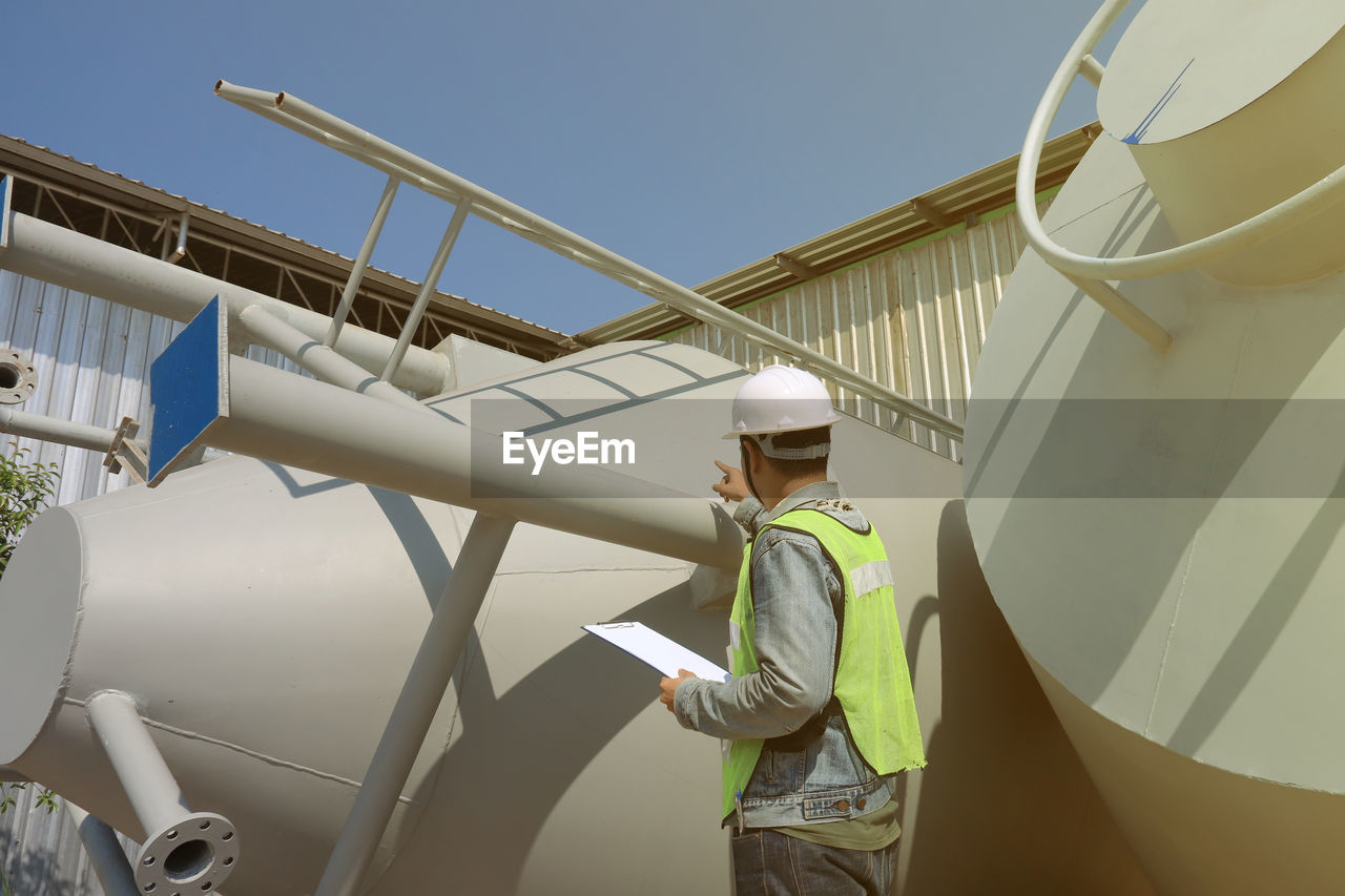 MAN WORKING WITH UMBRELLA