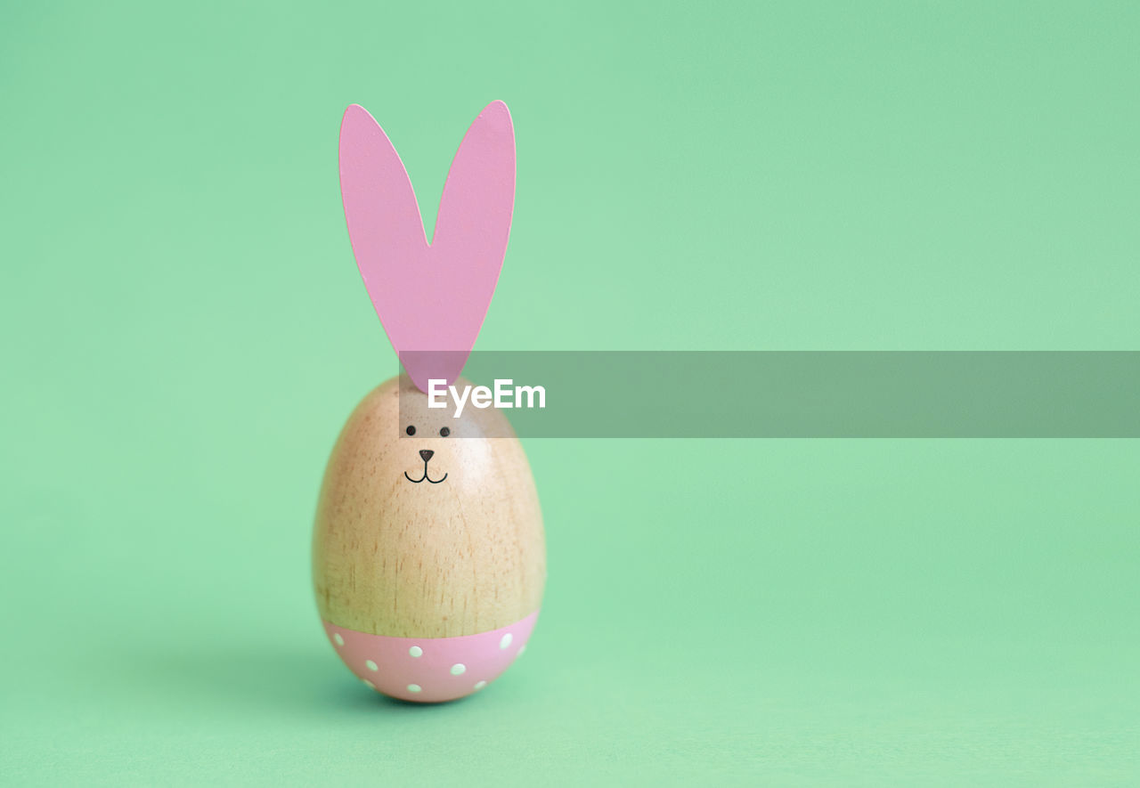 easter, egg, easter egg, celebration, holiday, pink, food, studio shot, tradition, easter bunny, colored background, no people, food and drink, indoors, creativity, representation, animal, rabbit, decoration, still life, animal representation, animal egg, close-up, fun, single object, copy space