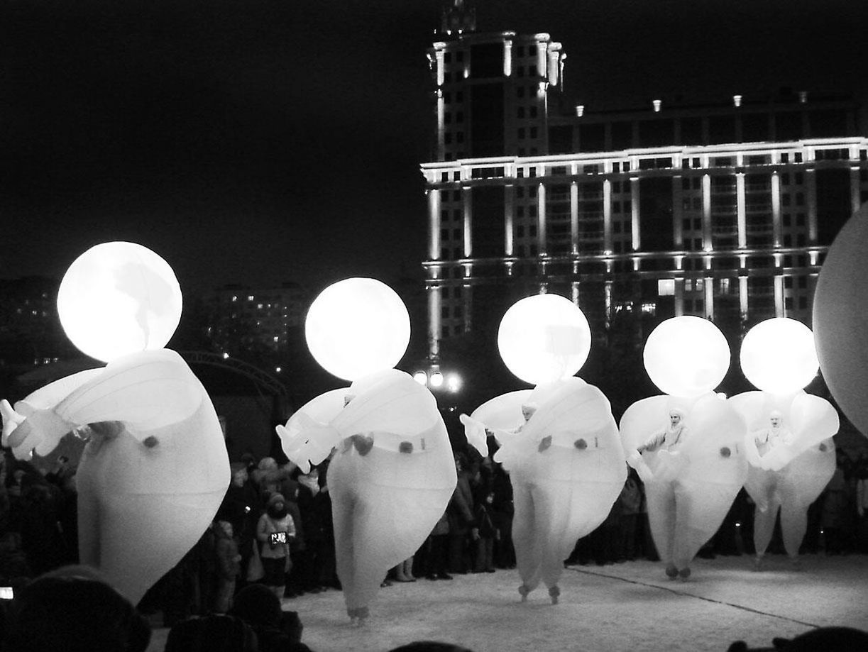 LOW ANGLE VIEW OF ILLUMINATED BUILT STRUCTURE