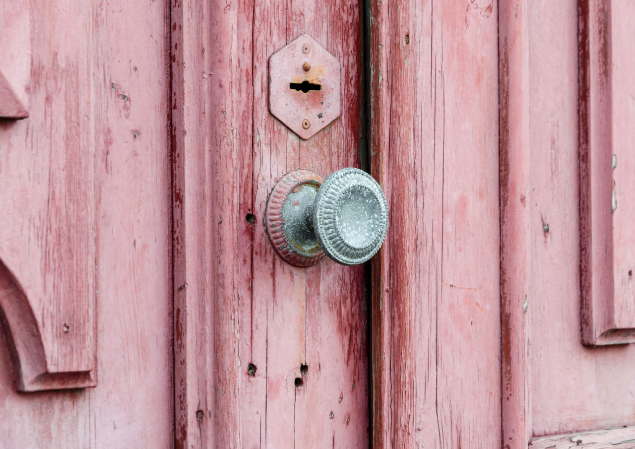 FULL FRAME SHOT OF OLD DOOR WITH RUSTY METAL