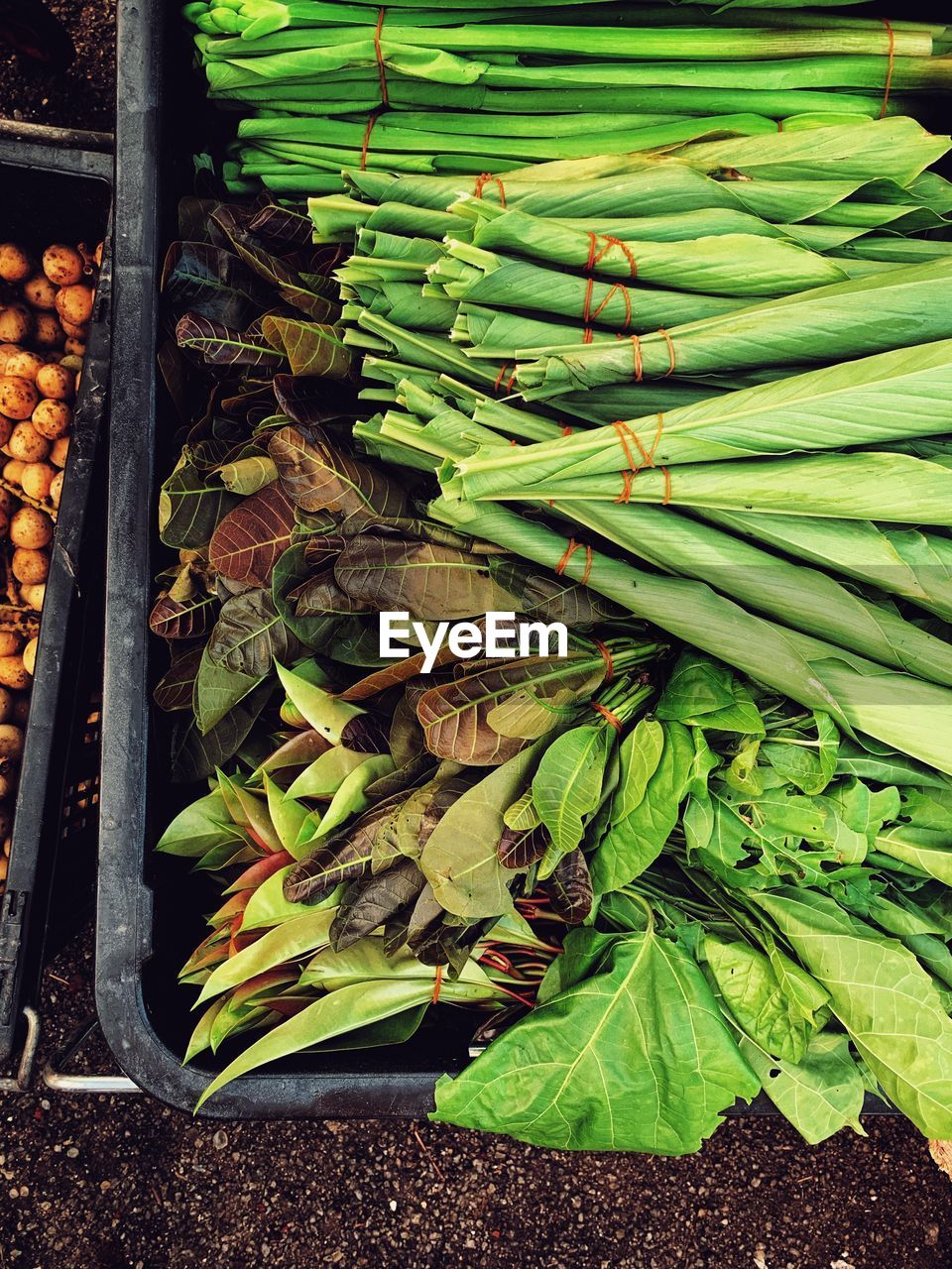 HIGH ANGLE VIEW OF VEGETABLES IN MARKET