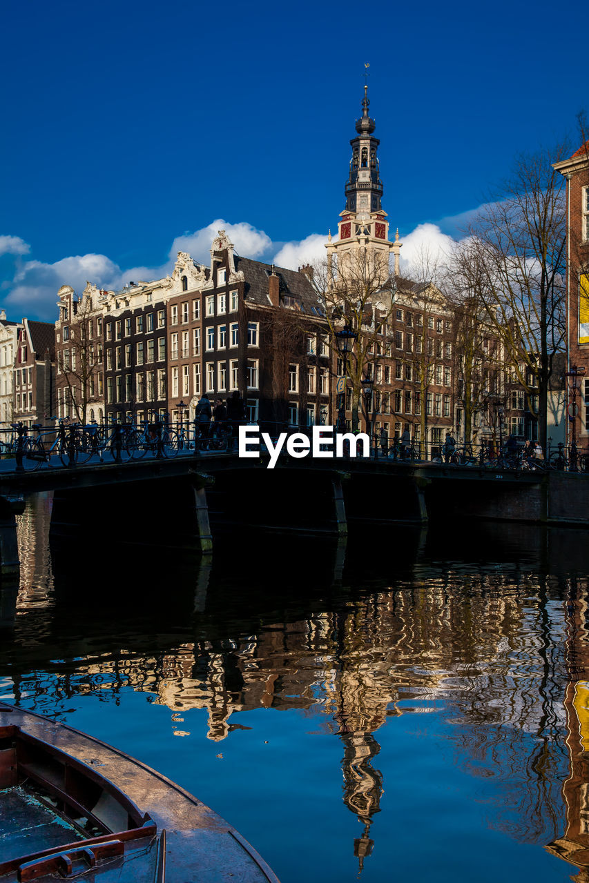 Canals, boats and beautiful architecture at the old central district in amsterdam