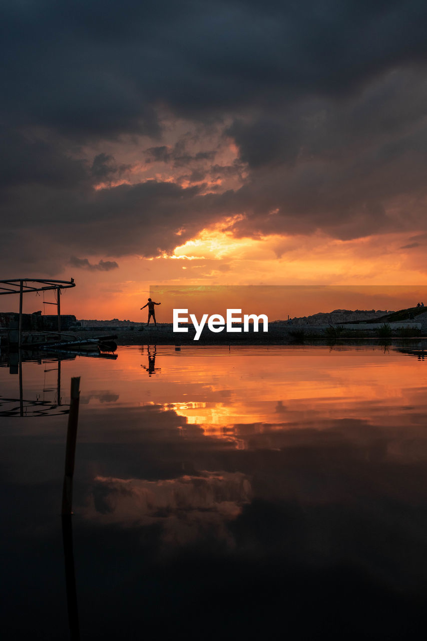 SCENIC VIEW OF SEA DURING SUNSET