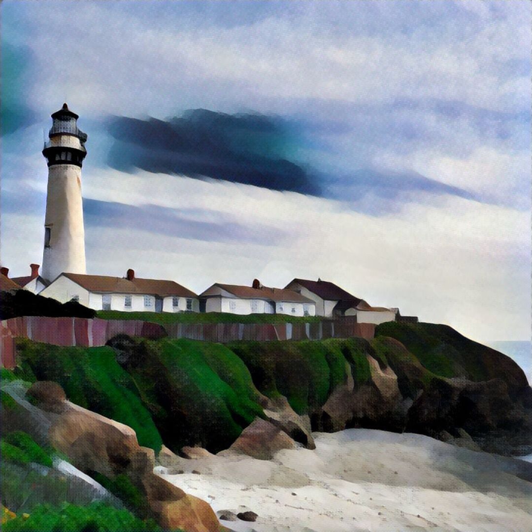 LIGHTHOUSE BY SEA AGAINST CLOUDY SKY