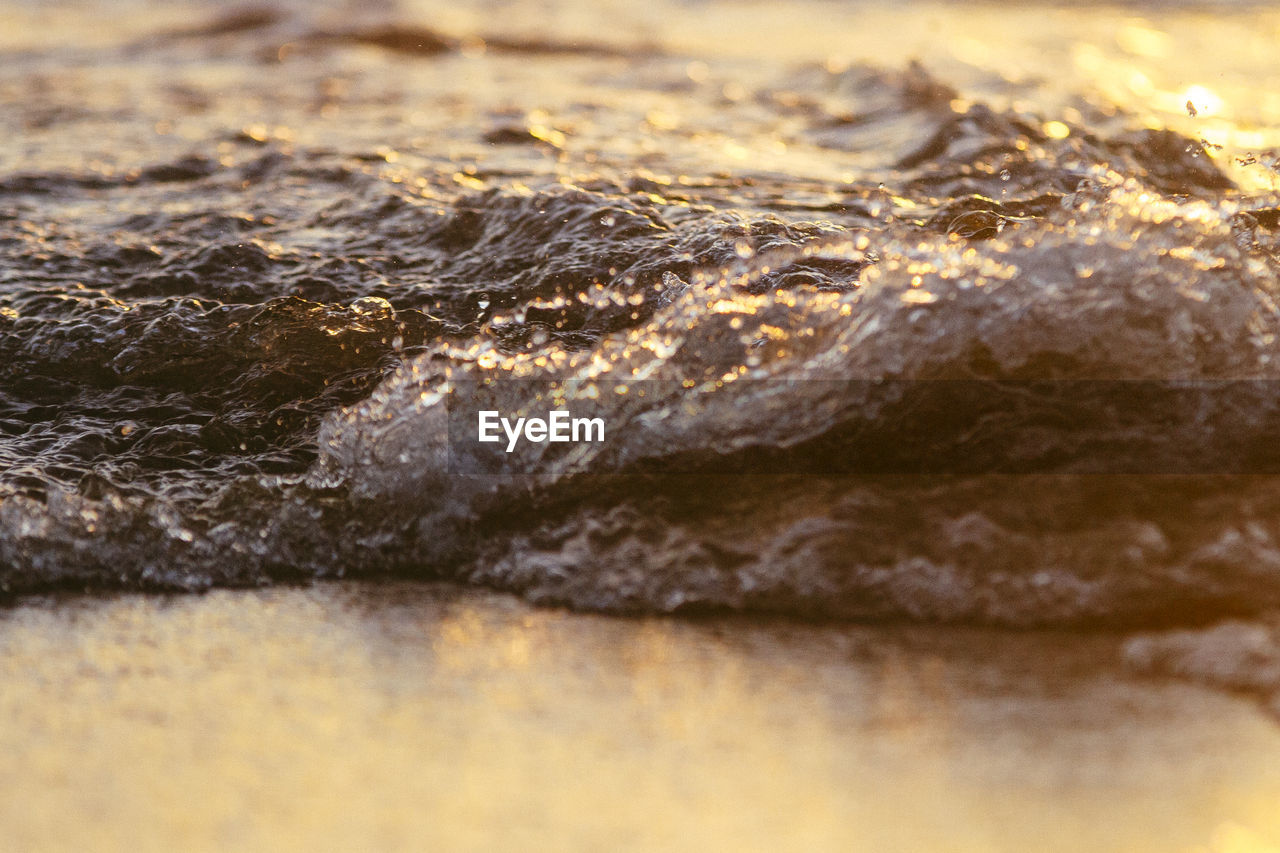 CLOSE-UP OF WATER IN SHALLOW