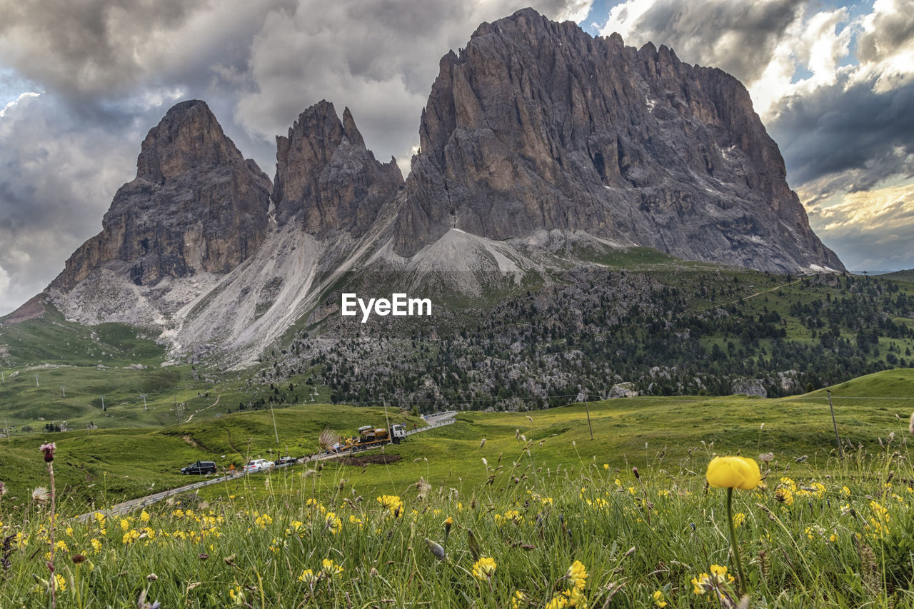 Scenic view of landscape and mountains against sky