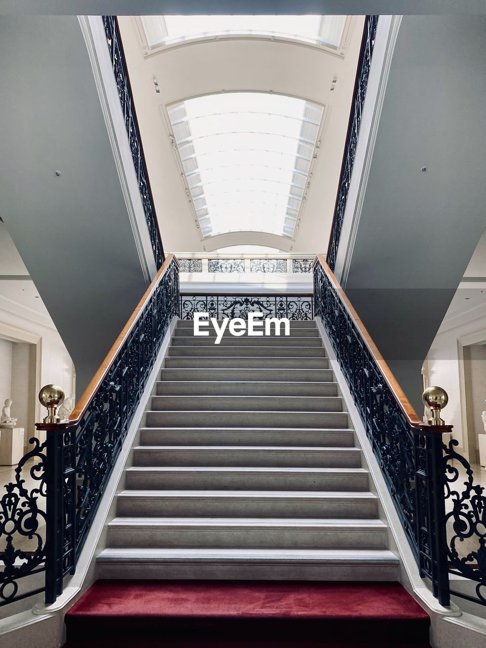 staircase, steps and staircases, stairs, architecture, railing, indoors, built structure, spiral staircase, room, spiral, handrail, interior design, daylighting, no people, low angle view, building, ceiling