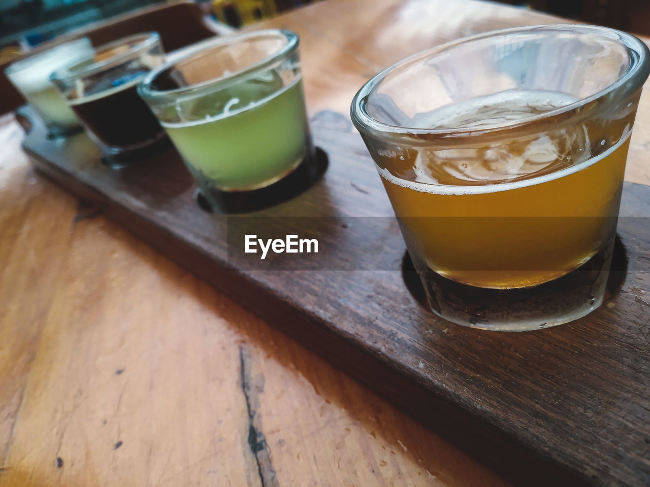 CLOSE-UP OF DRINK ON TABLE