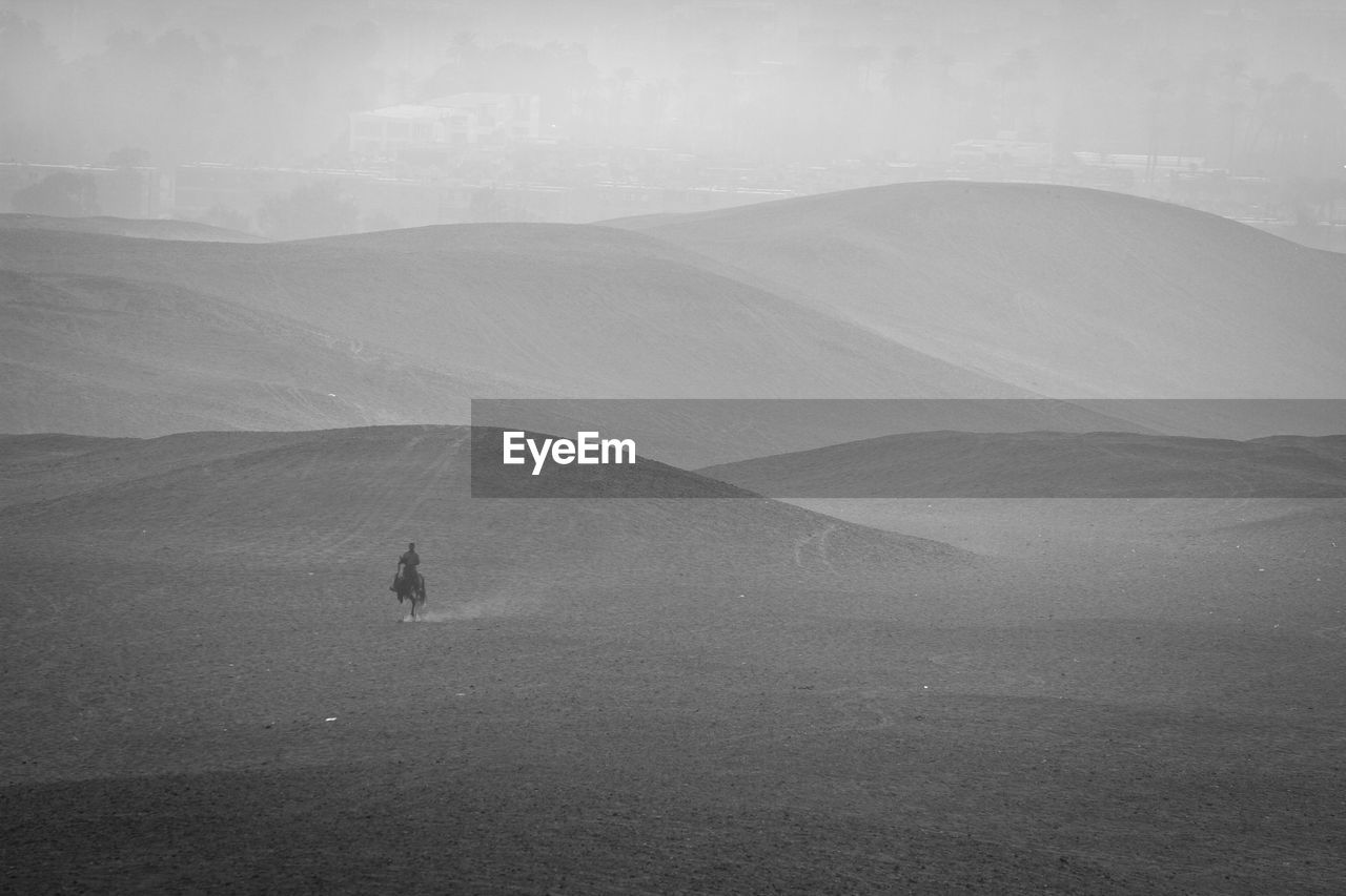 Scenic view of desert against sky