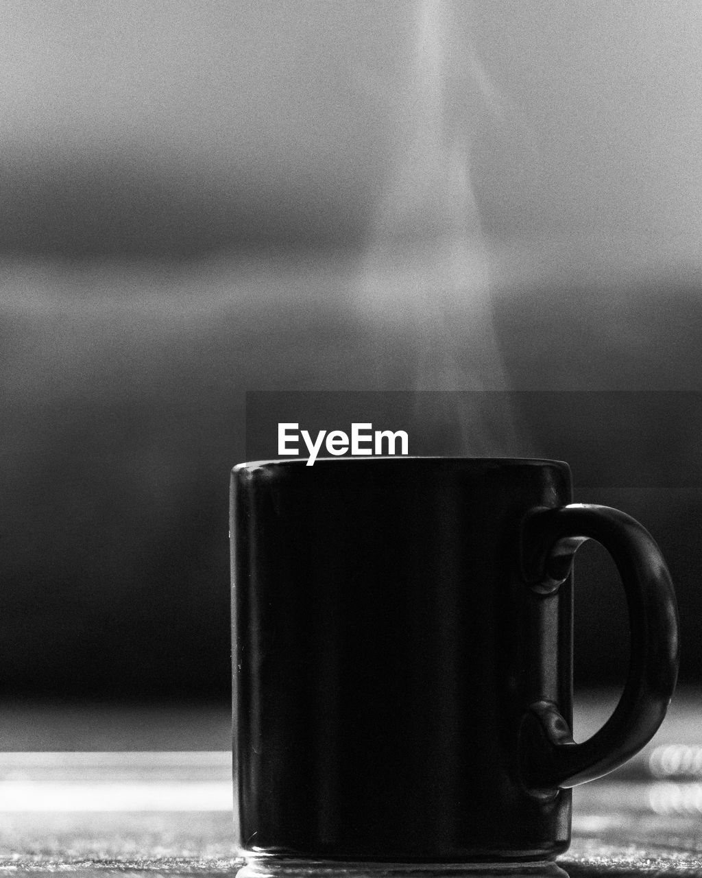 Close-up of coffee cup in water