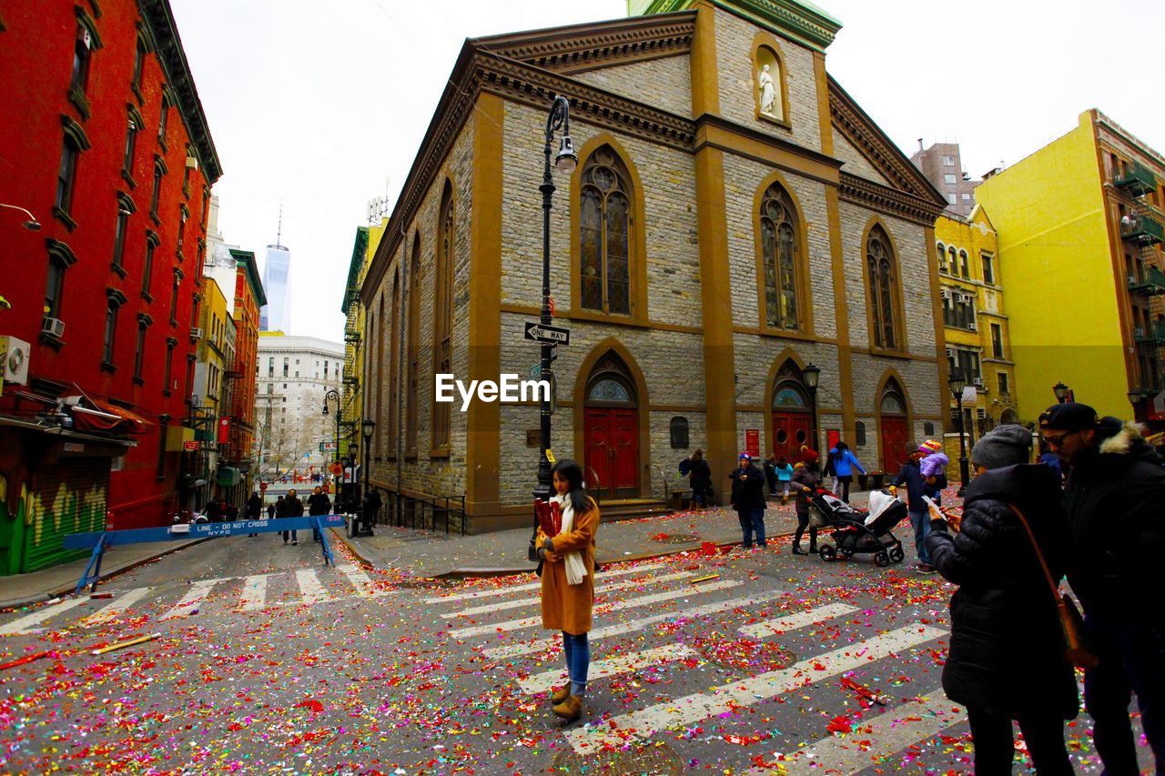 PEOPLE IN FRONT OF CATHEDRAL