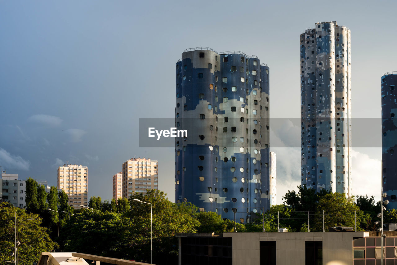 Low angle view of skyscrapers against sky