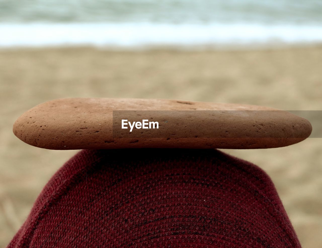 land, close-up, focus on foreground, beach, brown, sea, water, sand, red, nature, hand, day, outdoors, wood, sports