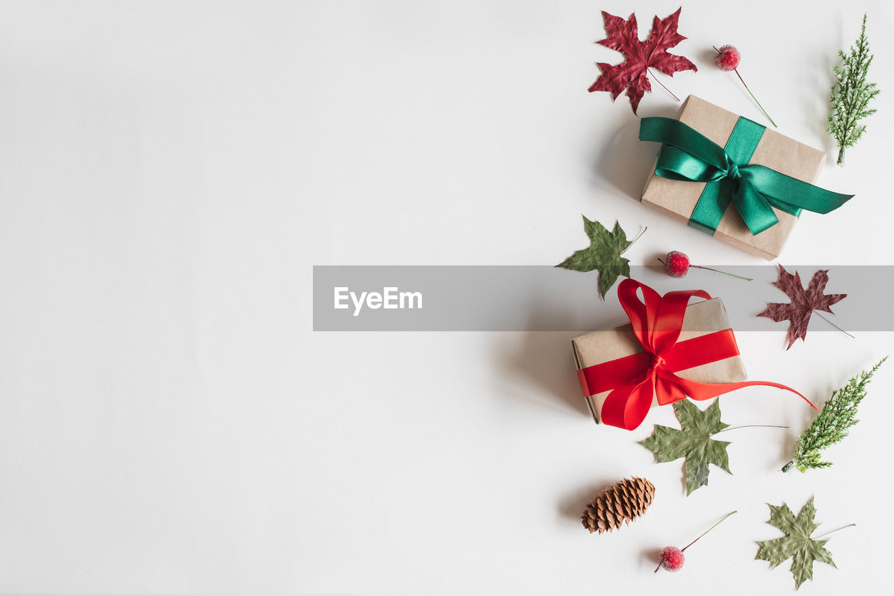 HIGH ANGLE VIEW OF CHRISTMAS DECORATION ON TABLE