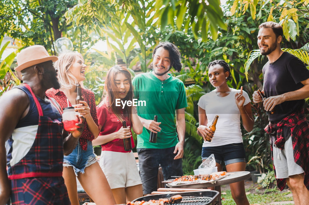 GROUP OF PEOPLE HAVING FOOD