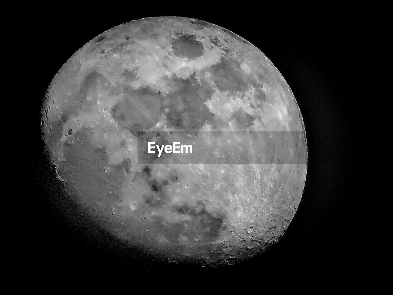 LOW ANGLE VIEW OF MOON IN SKY