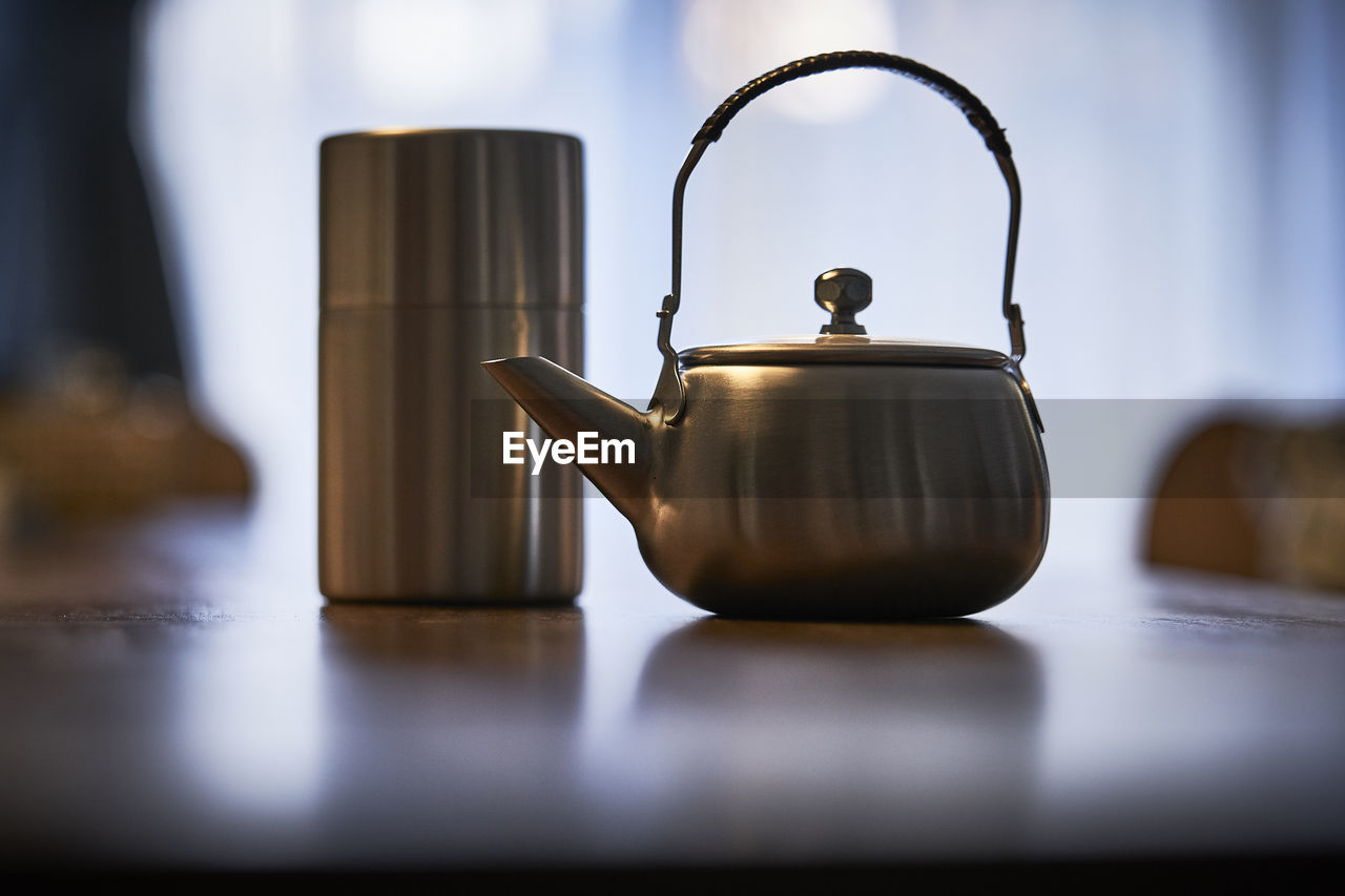 Tea kettle on table