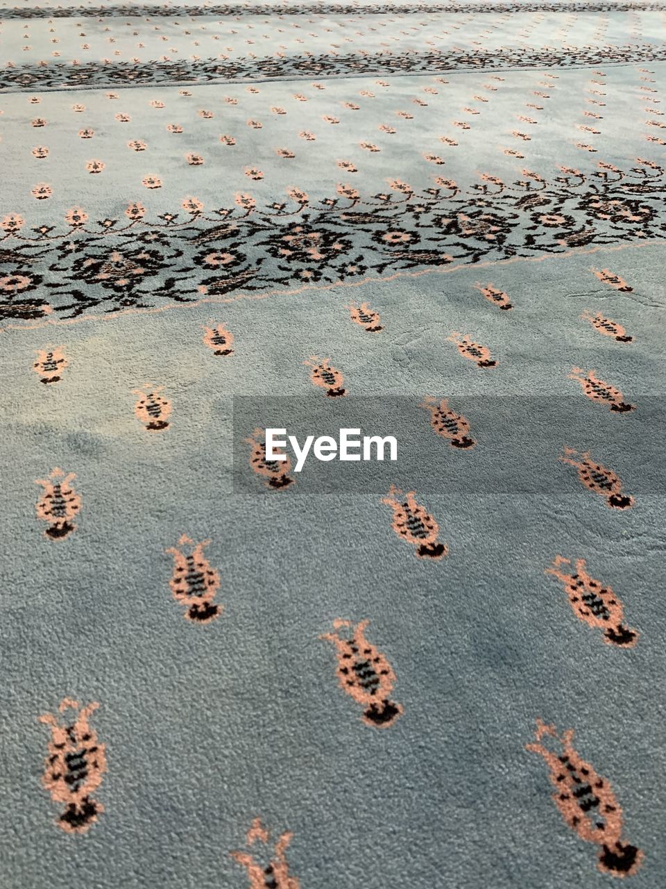 High angle view of prints on carpet in mosque in cesme