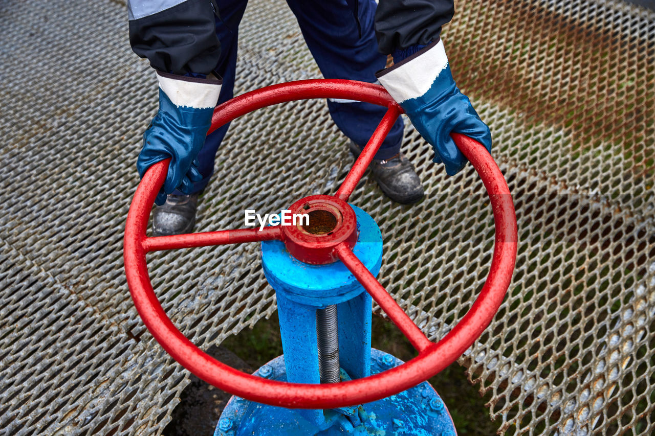 High angle of man working at factory