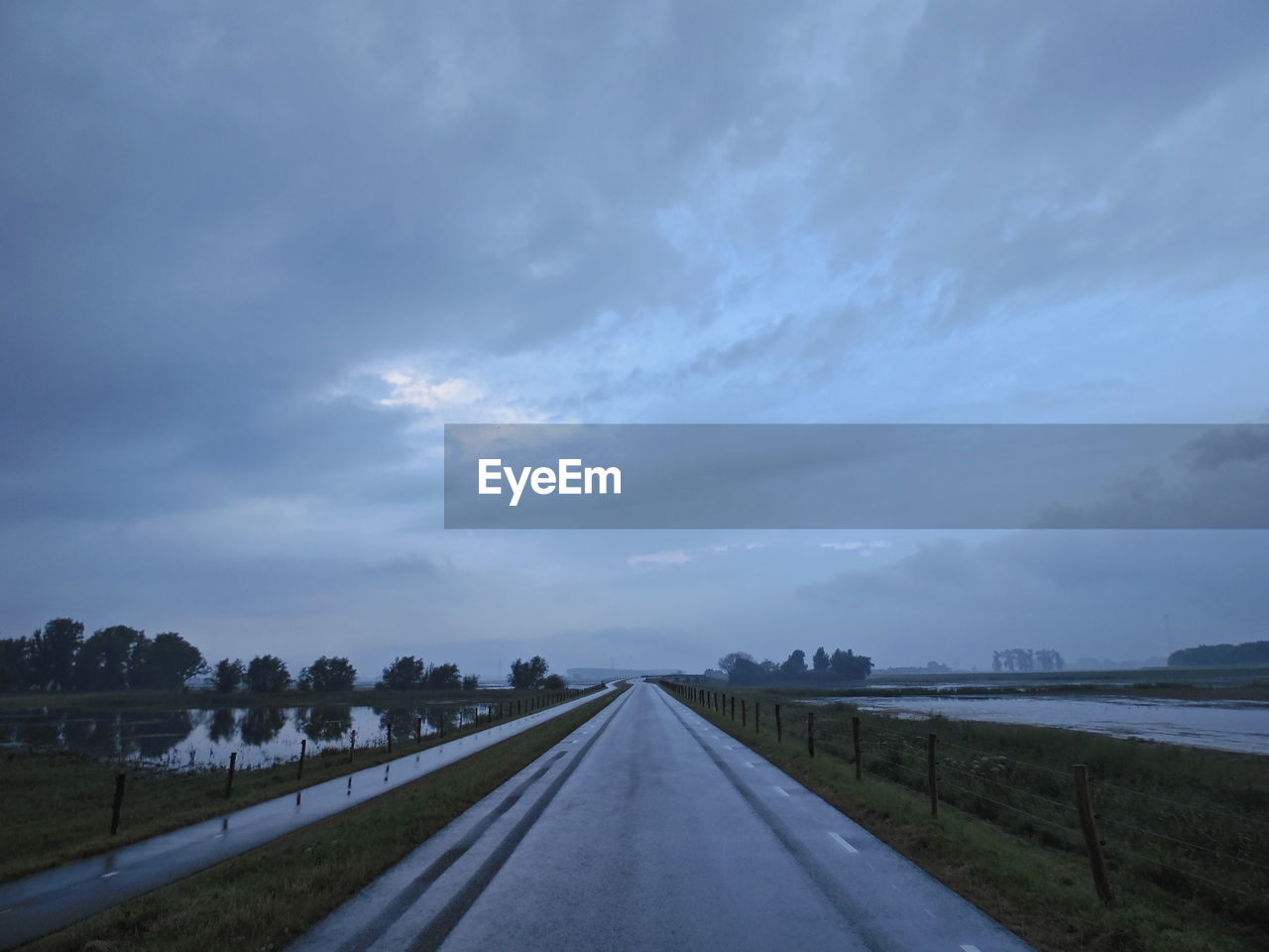 EMPTY ROAD ALONG LANDSCAPE