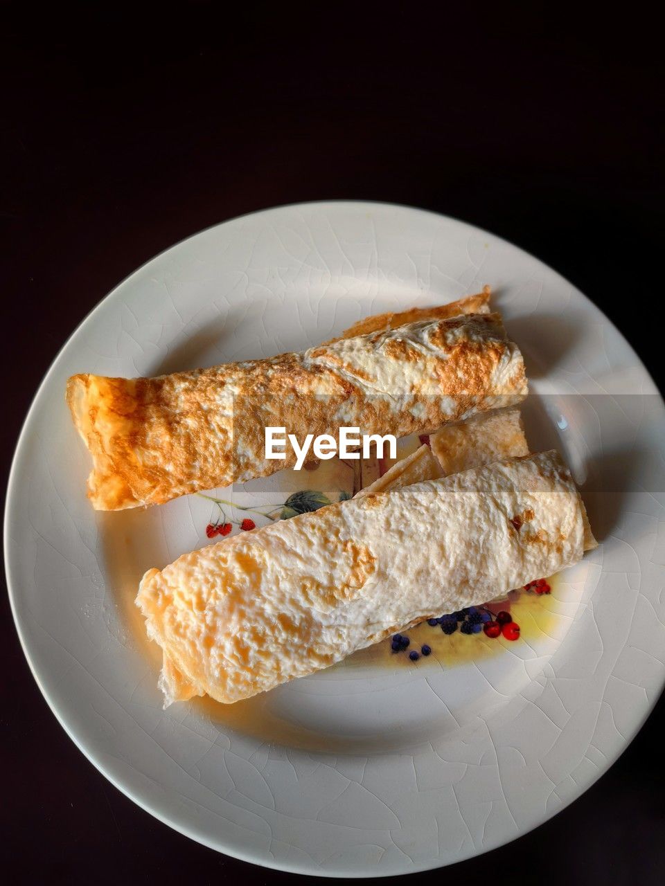 food, food and drink, fast food, plate, healthy eating, black background, freshness, dish, no people, produce, breakfast, studio shot, wellbeing, bread, indoors, seafood, meal, cuisine, dessert, baked