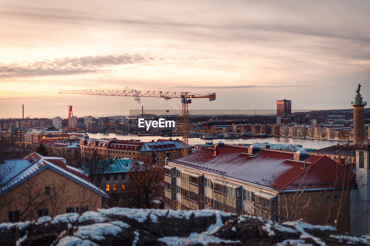 Crane over gothenburg.
beautiful city sunset with some snow.