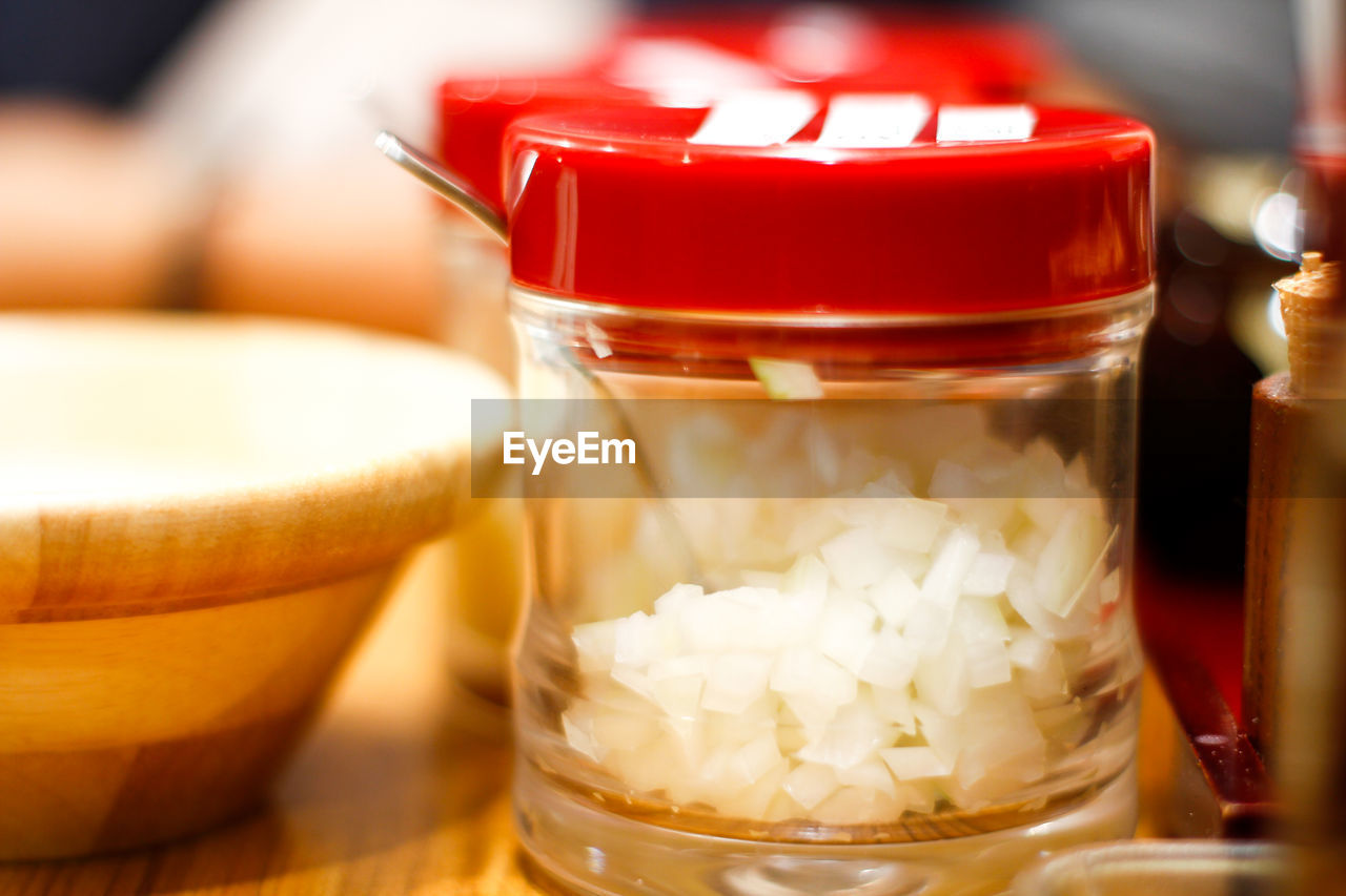 Close-up of radish pieces in container on table