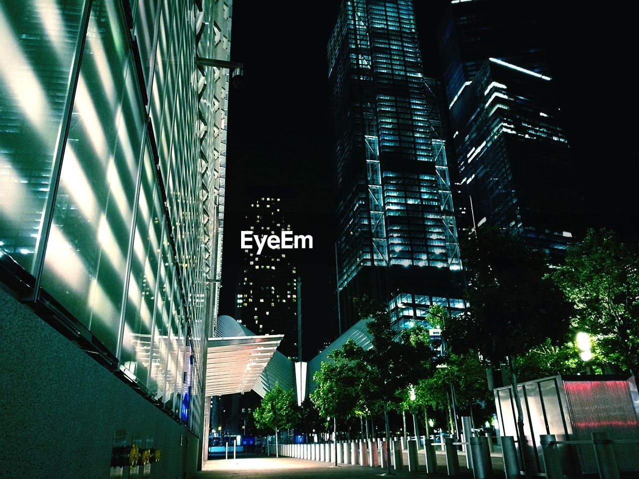 Low angle view of illuminated skyscrapers at night