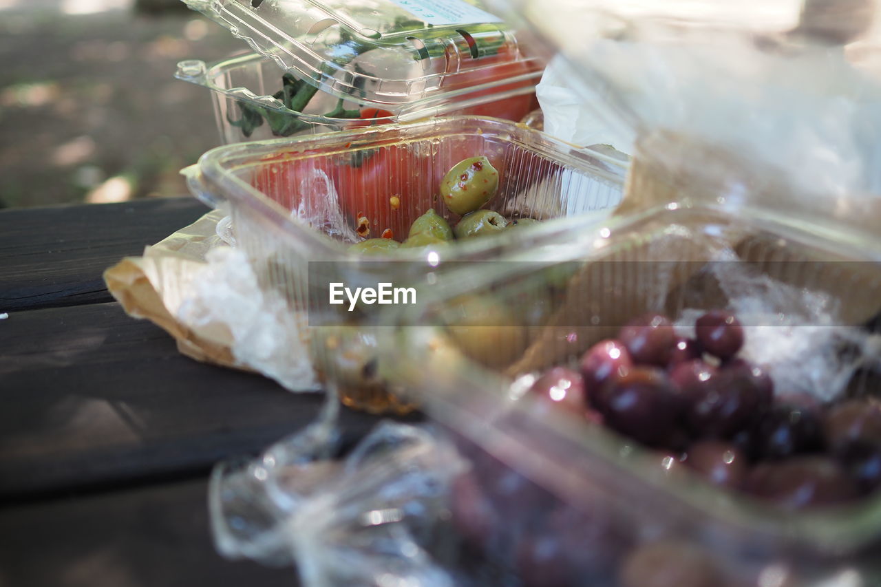 CLOSE-UP OF FRUITS IN GLASS CONTAINER