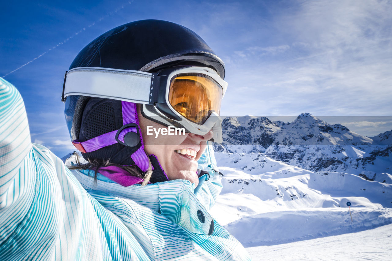 Woman in ski gear on mountain