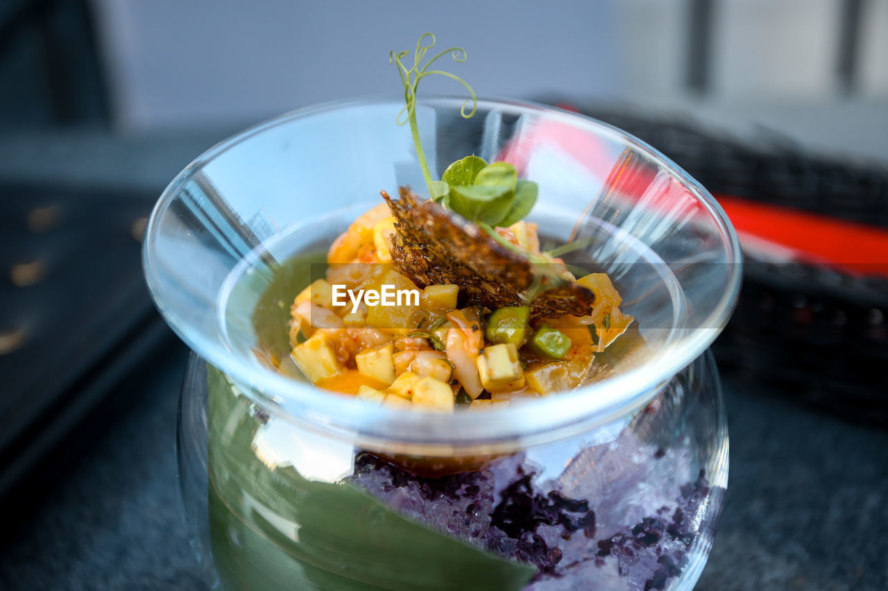 CLOSE-UP OF MEAL SERVED IN GLASS BOWL