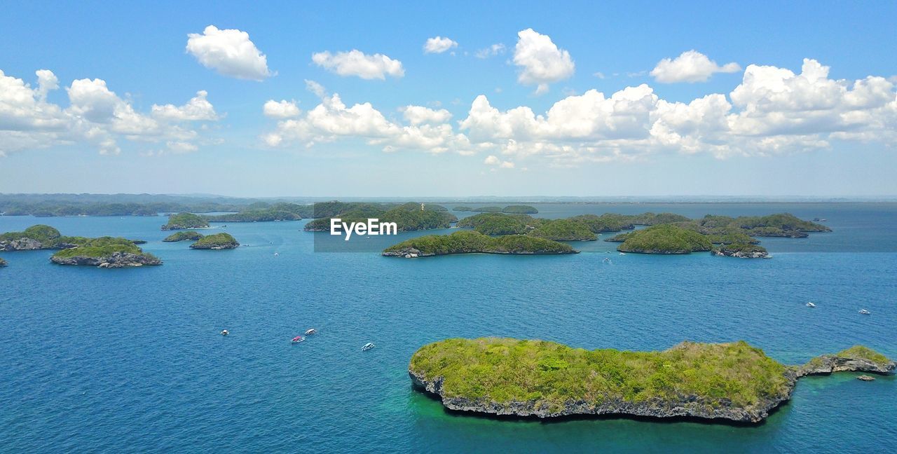 SCENIC VIEW OF SEA AGAINST BLUE SKY