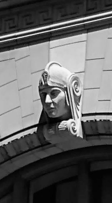 LOW ANGLE VIEW OF MAN WITH WINDOW