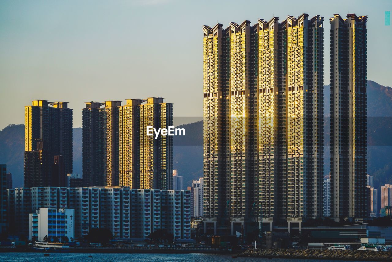 MODERN BUILDINGS AGAINST CLEAR SKY