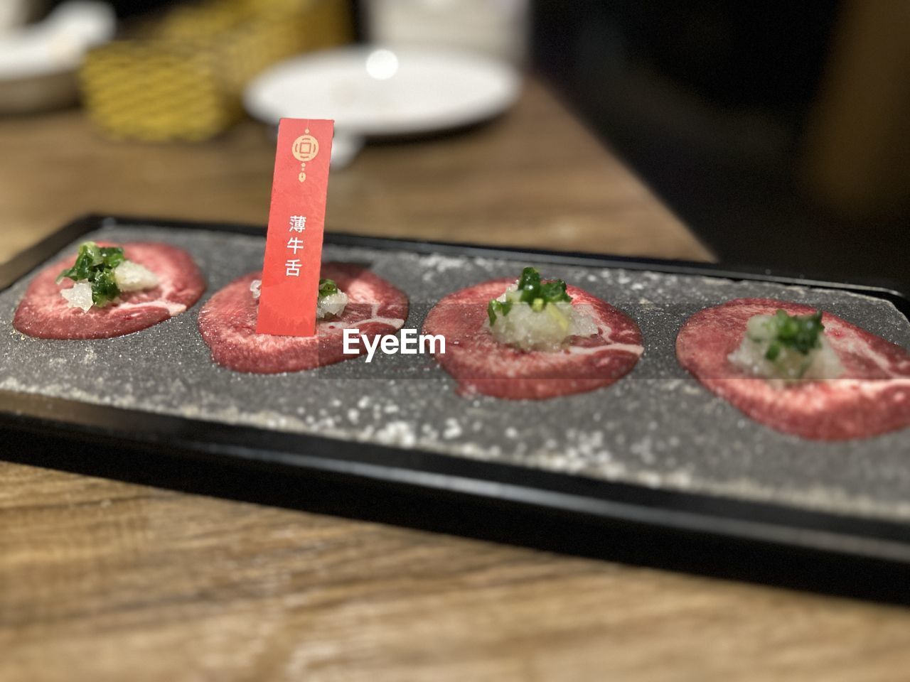 food, food and drink, freshness, dish, cuisine, meat, indoors, meal, no people, cooking, healthy eating, kobe beef, wood, fast food, table, selective focus, raw food, close-up, wellbeing, vegetable, still life