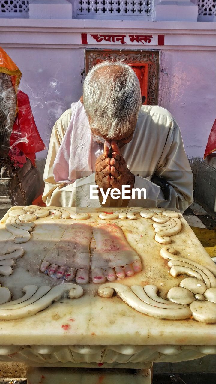 MAN WORKING WITH FOOD